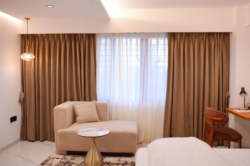 Seating and work area in the Triple Deluxe AC Room