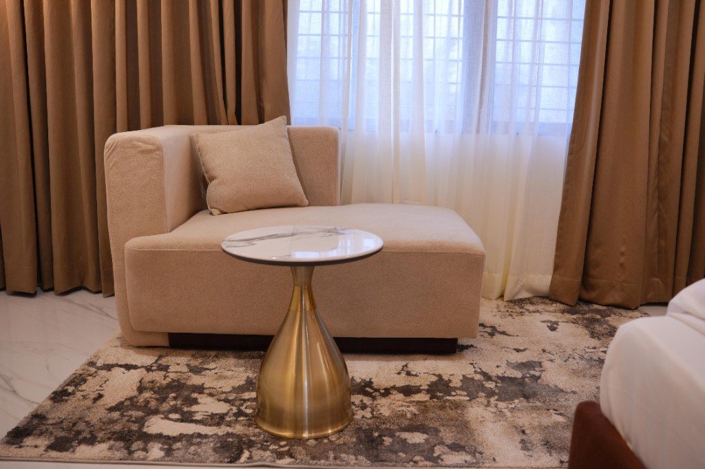 Lounge seating in the Triple Deluxe AC Room